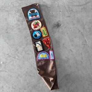 Vintage 1990's Girl Scouts Brown Sash Multiple Patches and Pin